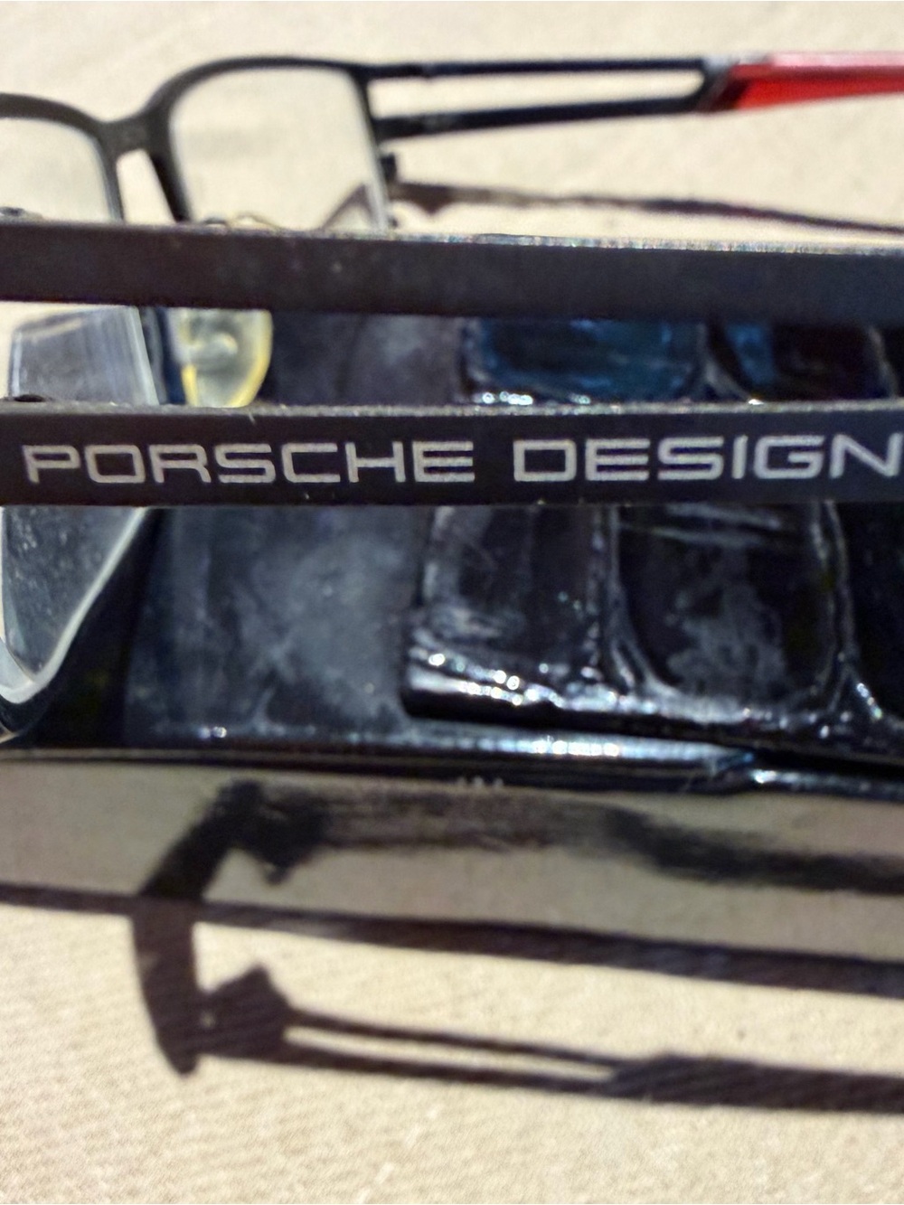 Porsche Design Black Frame with Red Temple Accent